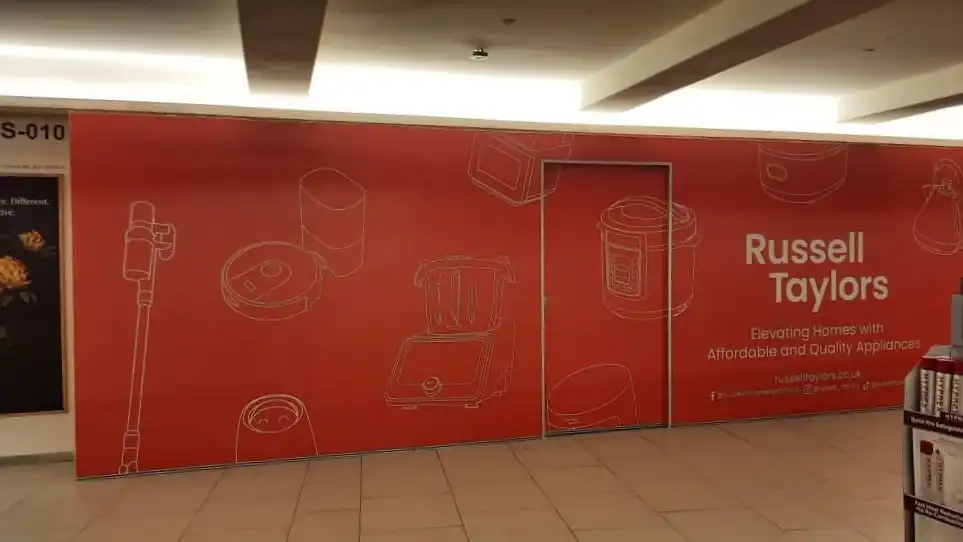Hoarding & Visual, Russell Taylors, Mid Valley